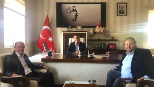 ÂŞIK YILMAZOĞLU'DAN HANAK KAYMAKAMI FATİH BAYRAM'I ZİYARET ETTİ