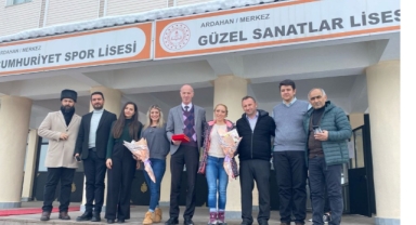 Dünya şampiyonları öğrencilerle bir araya geldi